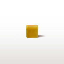 Load image into Gallery viewer, a small cube of wax